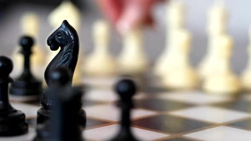 Yuriy Chess pieces. Chess board from hard strategy logic game.