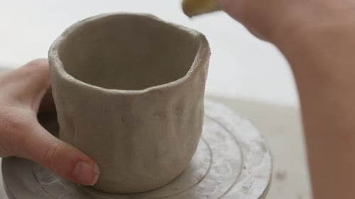 Clay Pot Shaping Process with Sponge Close Up