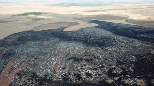 Aerial footage over Burnt hills in the desert