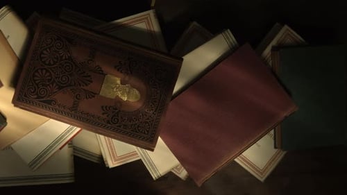 Top View of a Stack of Antique Books on a Table