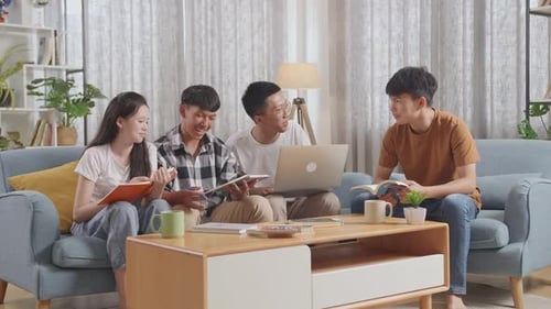 Group of Young Adults Studying Together at Home
