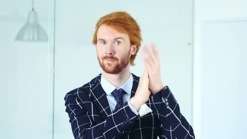 Man in Blazer Giving Polite Applause