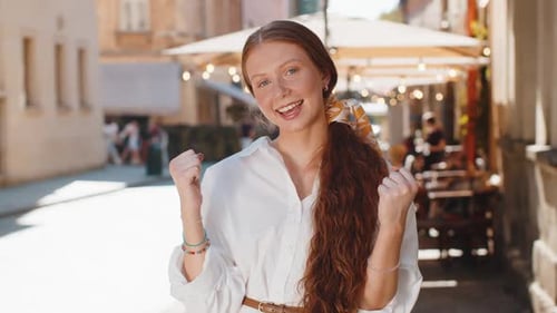 Adult Girl Shouting Celebrating Success Winning Goal Achievement Good Victory News in City Street
