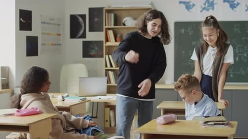 Rude Teenagers Teasing Their Classmate