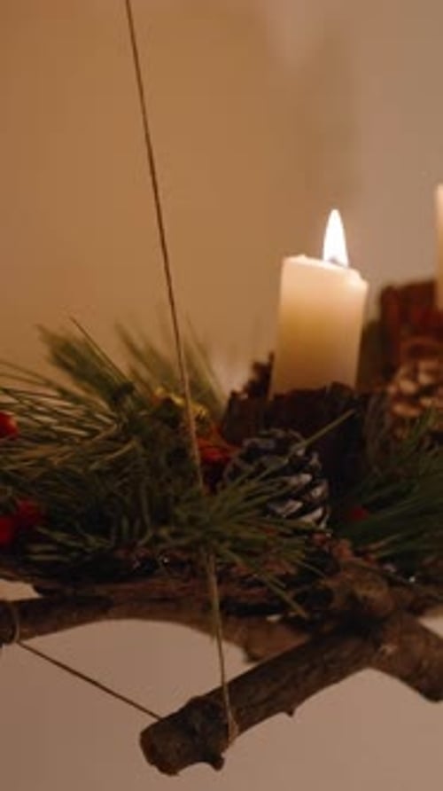 Vertical video. We made this Christmas installation with candles and Christmas ornaments on the bran