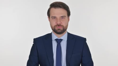 Man in Suit Stares at Camera