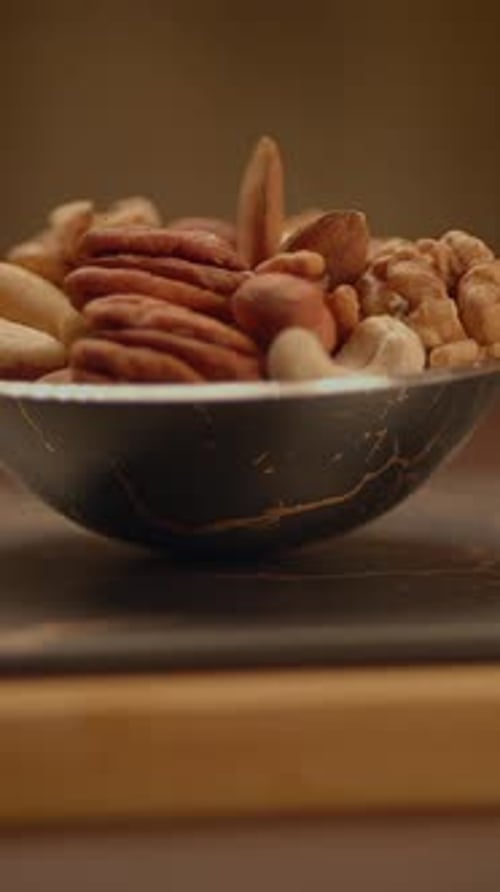 Enjoy a Healthy Mixed Nuts Snack Served Beautifully in an Elegant Bowl for Any Occasion