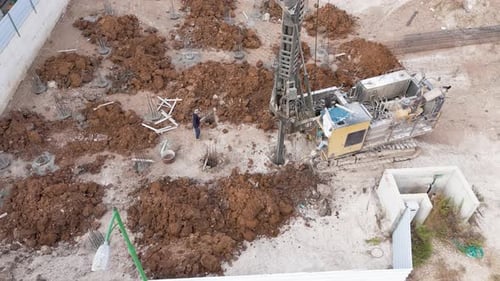 Aerial view of construction site with drilling rig, Israel.