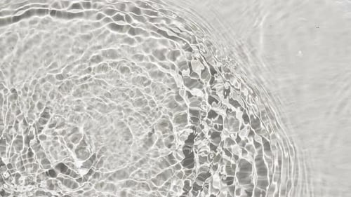 Pure Beige Water with Reflections Sunlight in Slow Motion Water Surface Texture Top View Sun and