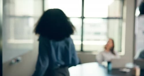 Office Workers Gather Around Table for Business Meeting