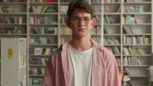 In School Library Book Store University College Upset Frustrated Caucasian Student Boy Looking at