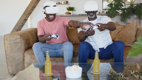 Father and Son Enjoying VR Gaming Experience