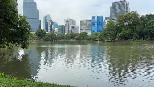 Lumphini Park Bangkok Thailand – City Park with Lake and Bangkok Skyscraper Skyline, Urban Nature