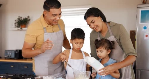 Happy Family Baking Together in Home Kitchen