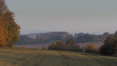 Beautiful hilly autumn landscape. Autumn leaves in forest. Czech republic