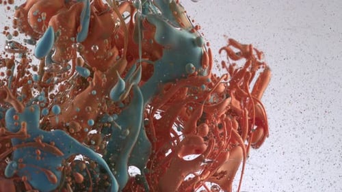 Abstract Paint Swirls Mixing Together on a White Background