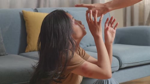Asian Woman Victim Of Violence With Bruise On Body Being Hit And Shouted By A Man At Home