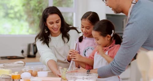 Family Baking Together in a Bright Kitchen
