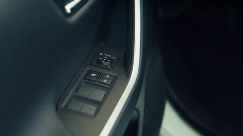 Details Close Up Shot of Car Door Lock Controls