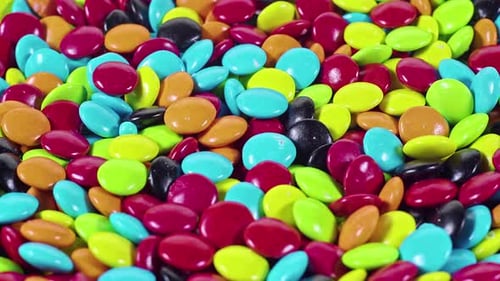 Delicious Colorful Candies Spinning On The Table