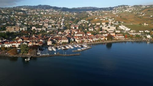 A Stunning Parallax Drone Capture of Lutry Port Amidst Vibrant Autumn Colors