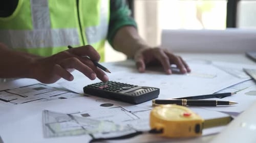 Construction engineering cost estimates blueprint measurements and project budget calculations