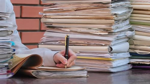 Sign documents concept. Businesswoman signing many documents