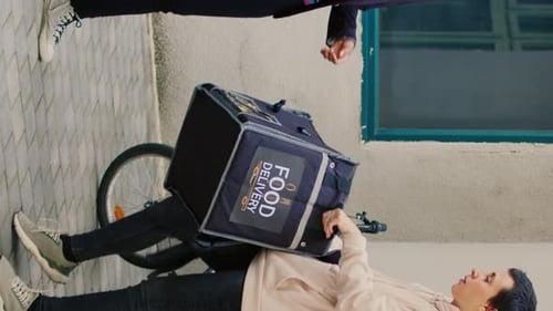 Vertical Video Woman Using Credit Card to Pay for Lunch Package on Pos Terminal