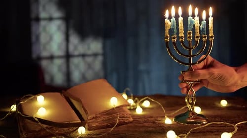Hanukkah Menorah and Candles on a Table