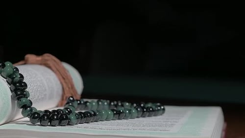 Ramadan Spiritual Scene with Quran and Tasbih Close Up