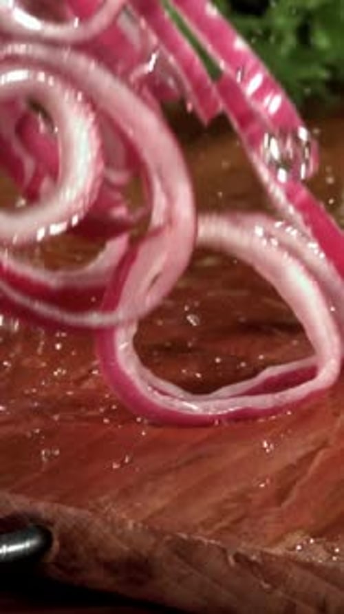 The Chopped Onion Falls Onto the Cutting Board Filmed on a Highspeed Camera at 1000 Fps