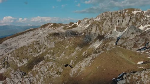 Rocky Snow Mountains Before Sunset Aerial
