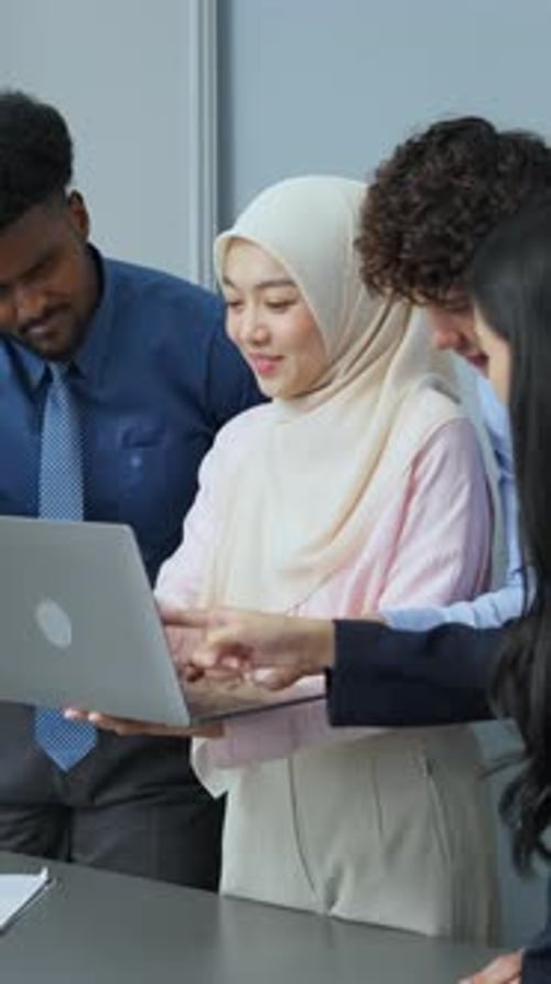 Diverse group of professionals collaborating on a project