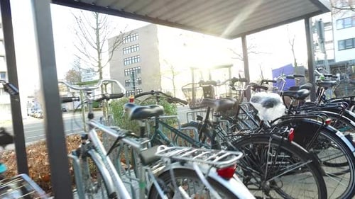 Fast camera movement behind parked bycicles