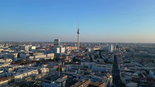 Berlin tv tower and red town hall, golden hour. Majestic aerial view flight drone