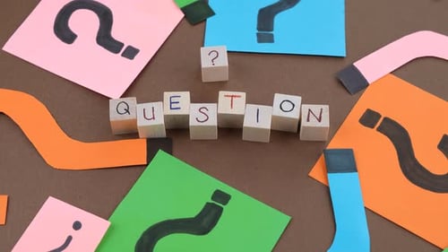 Colorful Question Mark Design with Wooden Block Letters