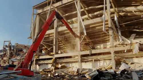 High Excavator Crusher Destroys Column of Old Hockey Stadium