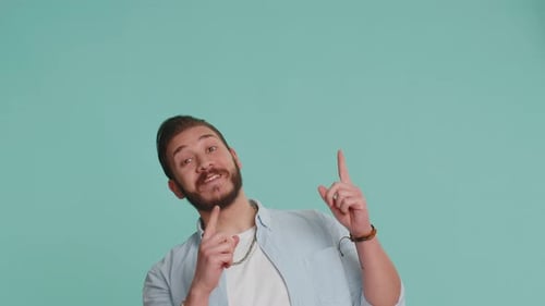 Lebanese Man Showing Thumbs Up Pointing Empty Place Advertising Area for Commercial Text Copy Space