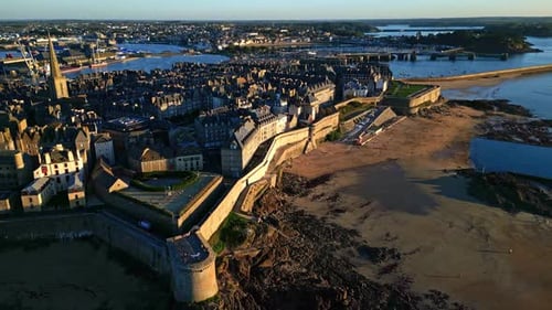Saint-Malo Intra Muros landscape at sunset, Saint Malo, Brittany in France. Aerial drone sideways