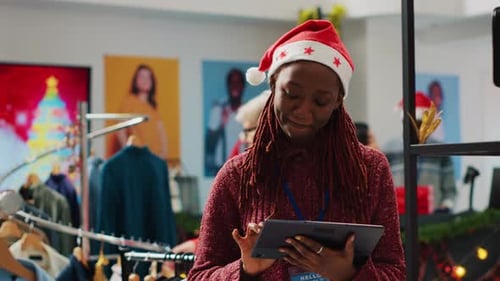 Employee Imputing Price List on Tablet
