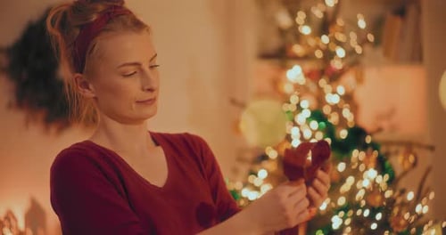 Woman Preparing Christmas Wreath Preparations For Christmas Holidays