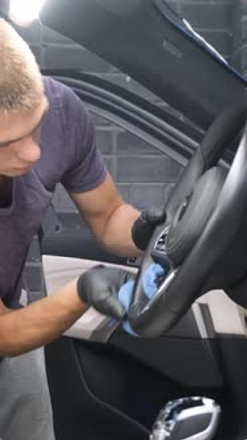 Professional Cleaning of the Car Interior Vacuuming the Car Interior Car Dry Cleaning Vertical