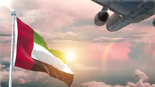 National Flag Waving with Airplane Flying in Sunset Sky