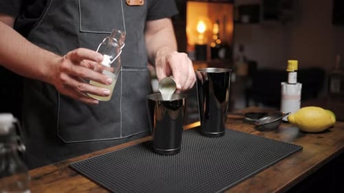 Bartender Mixing Cocktail at a Bar