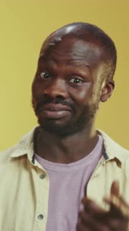 Doubtful Male Expression Closeup Image of Thoughtful Man Displaying Hesitation and Dry Humor