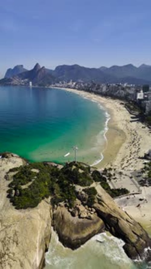 Drone Ascending Over Pedra do Arpoador Ipanema Beach Rio Brazil