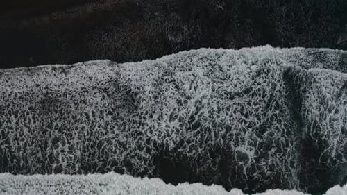 Top Down Aerial View From Drone of Volcanic Black Sand Beach