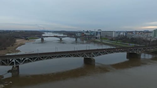 Fast Train Moving Across Swietokrzyski Bridge Over the Vistual River in Warsaw Poland