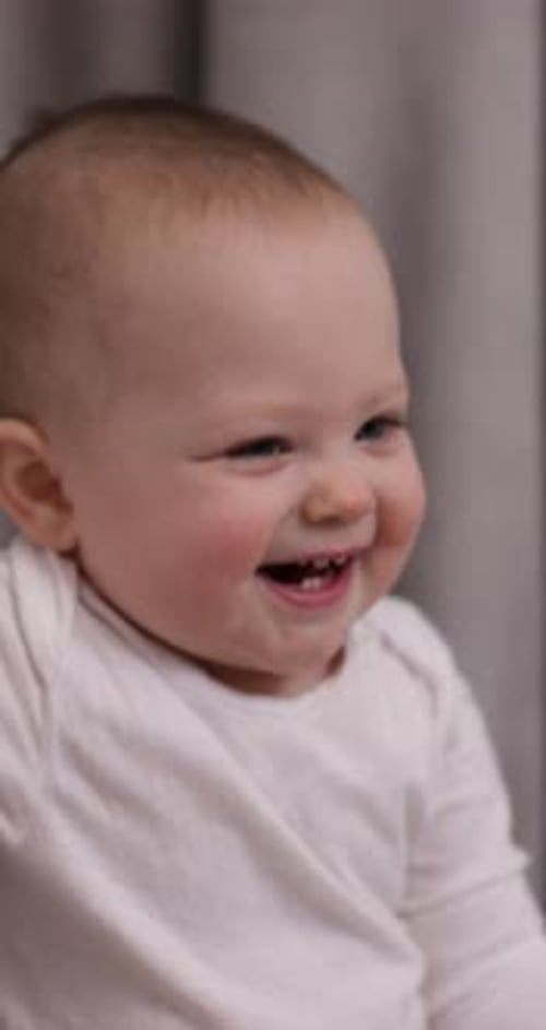 Smiling Infant Close Up Portrait in a Home