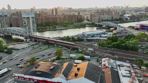 An aerial view of a city with a bridge